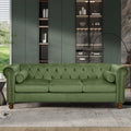 Canapé Chesterfield en Velours Vert 74,5 avec capitonnage, accoudoirs arrondis, pieds tournés et design élégant