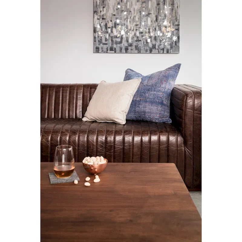 Canapé en cuir moderne Aurelle Home Caolo à coutures matelassées