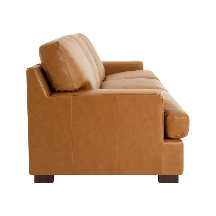 Canapé moderne en cuir véritable avec pieds en bois et coussin traversin supplémentaire